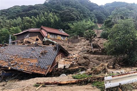 Heavy rains cause flooding and mudslides in southwest Japan, leaving 2 dead and at least 6 missing